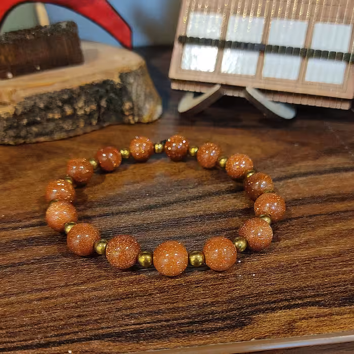 دستبند سنگ دلربا قهوه ای