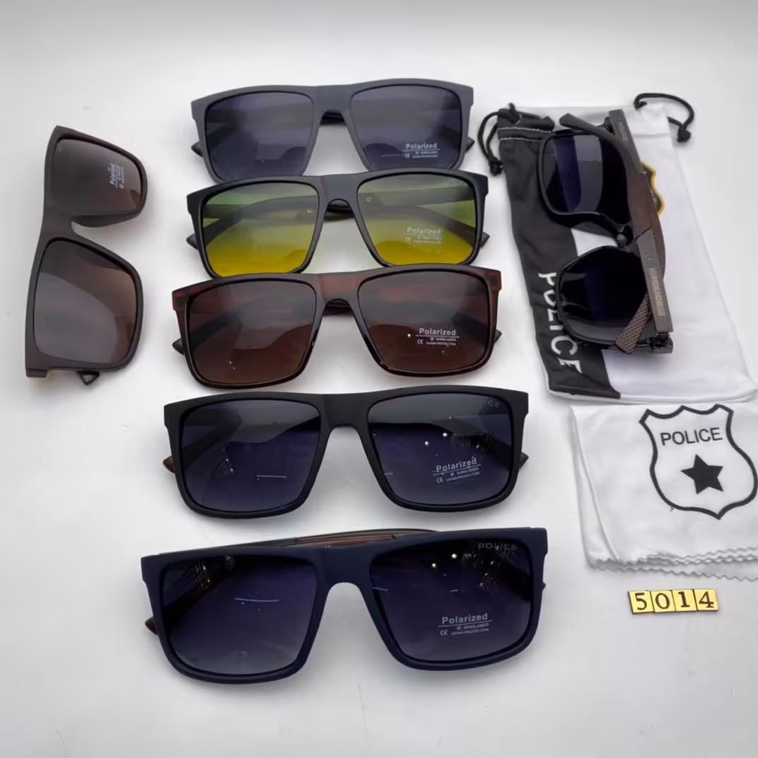 عینک آفتا بی  پلیس دسته چوب کد 5014پلاریزه تلق 1/1 ؛همراه با کیسه ودستمال مخصوص پلیس 