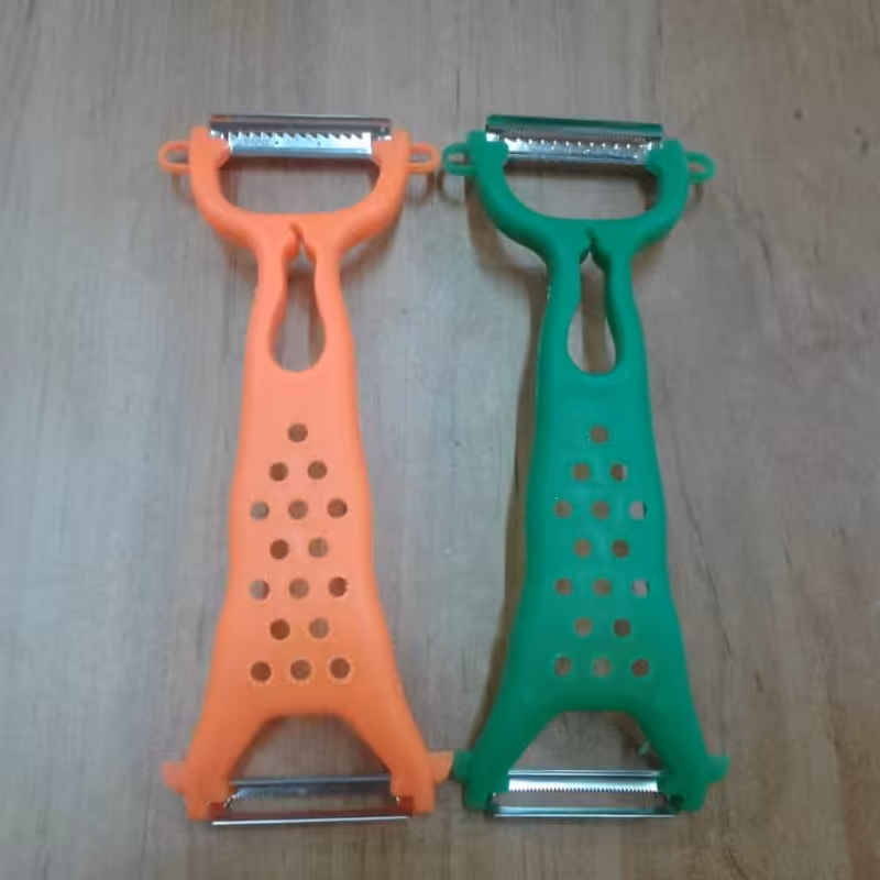 پوست گیر سه کاره تیز دارای 2 رنگ 2طزح تیغه