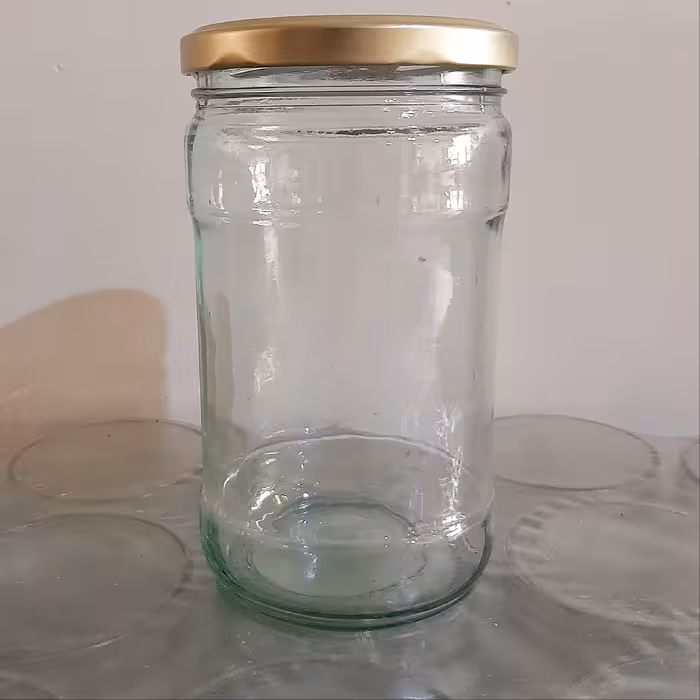 جار شیشه ای با درب فلزی.ظرفیت 850گرم عسل (40عدد)