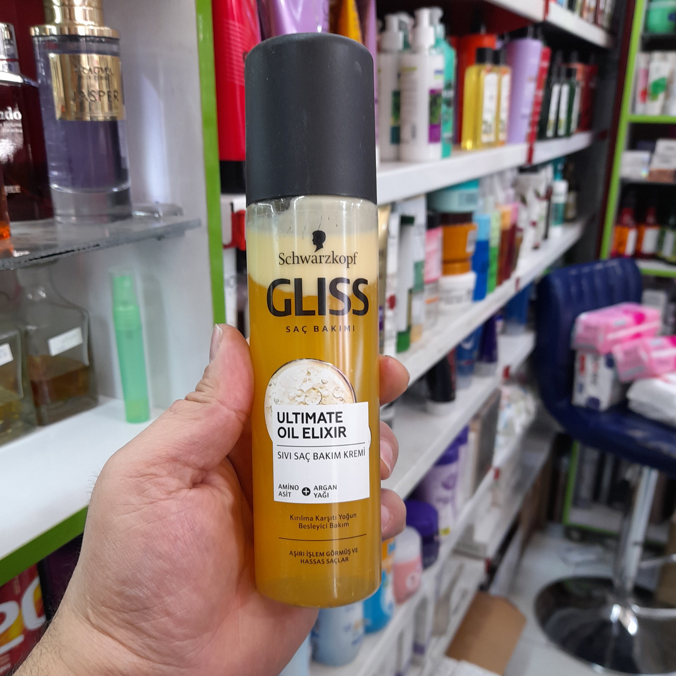 اسپری نرم کننده مو گلیس مدل ultimate oil elixir با حجم 200 میل