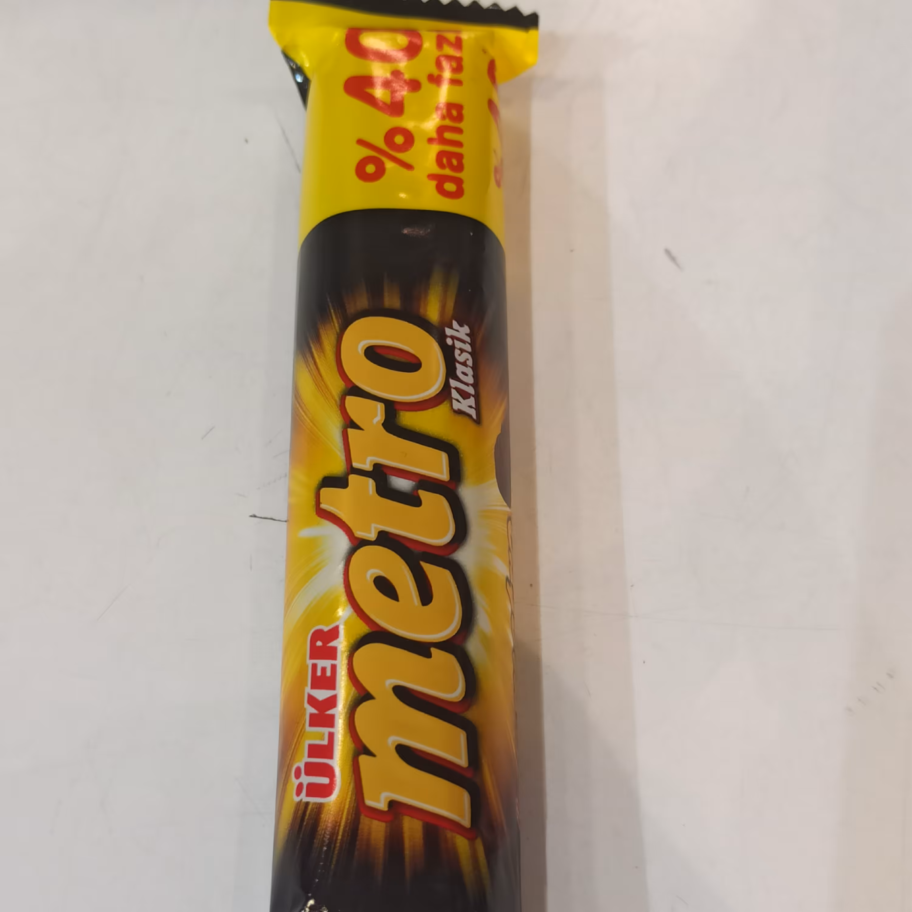 شکلات (metro) 50 گرم دوبل اولکر با مغز بادام و کارامل و روکش کاکائو 40 درصد اصل