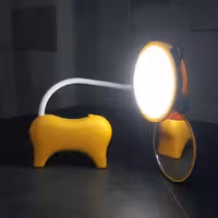 چراغ مطالعه و چراغ خواب مدل دوربین در رنگ زرد در دو حالت پر نور و نور کم