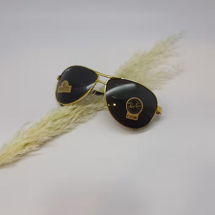 عینک آفتابی اسپرت  برند RAYBAN جنسیت فریم تمام قاب فلزی دسته فنری  جنسیت عدسی  شیشه uy400 فریم طلایی عدسی دودی بزرگ