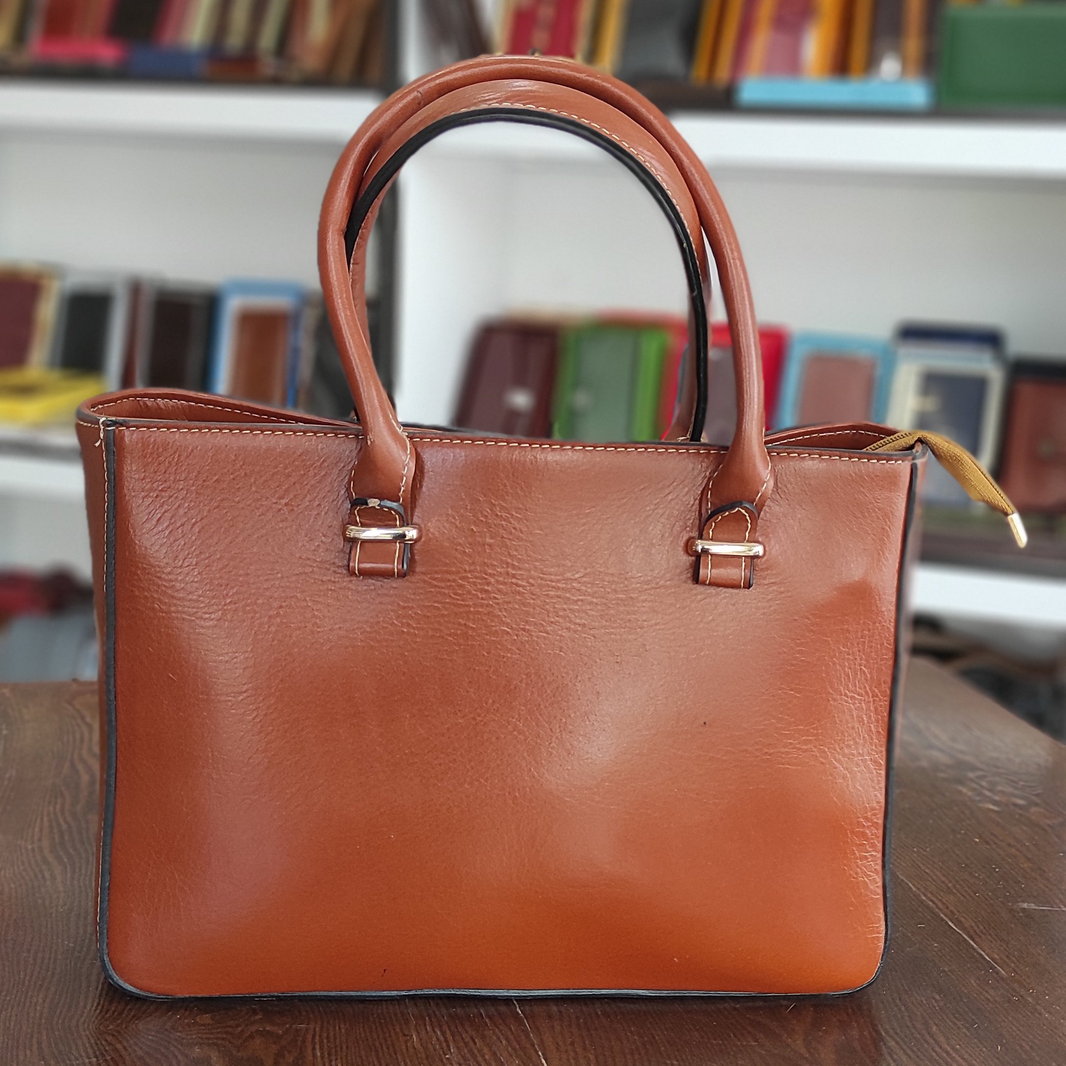 کیف مجلسی زنانه چرم طبیعی گاوی دارای بند دستی و جادار