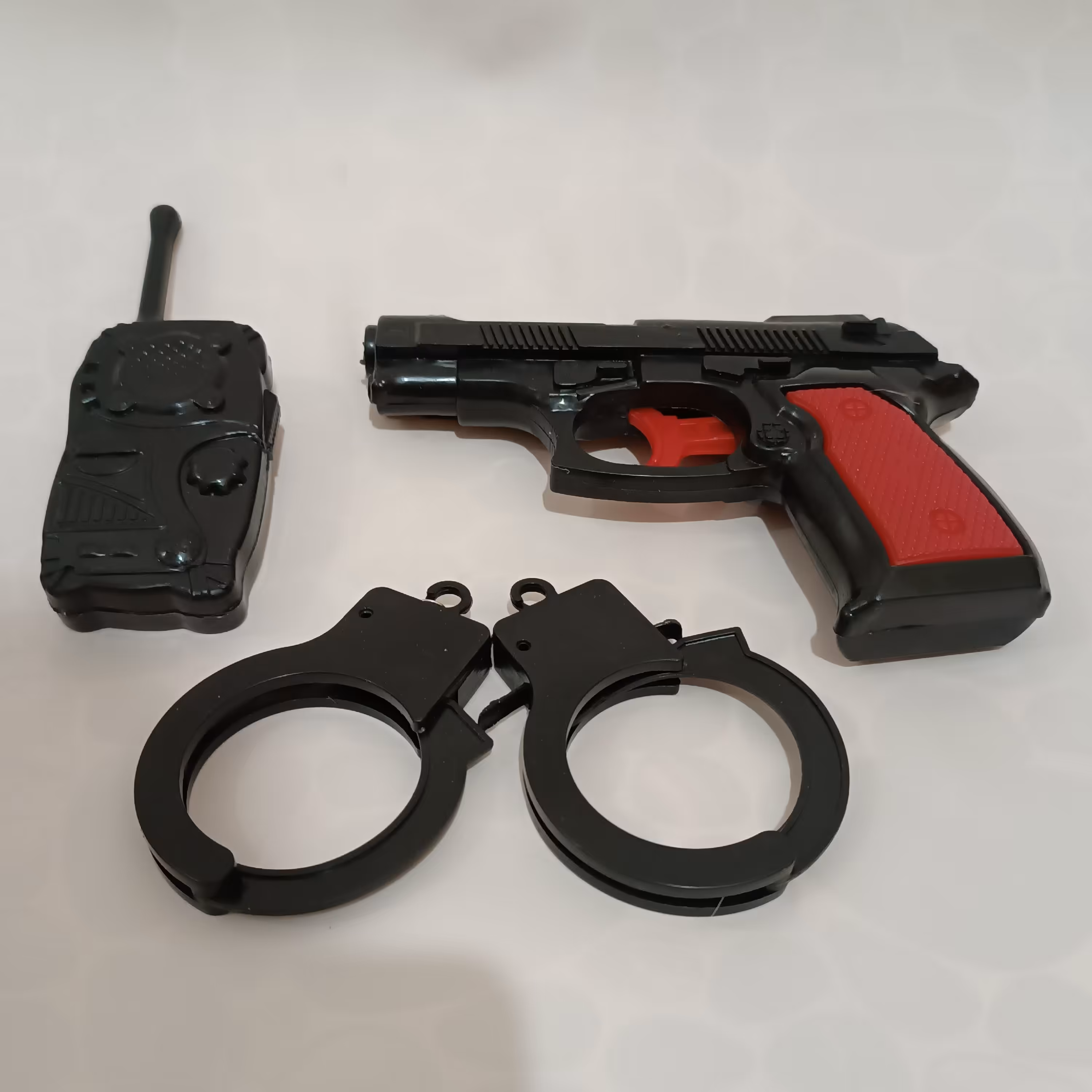 اسباب بازی،ست تفنگ ،دستبند،بی سیم،