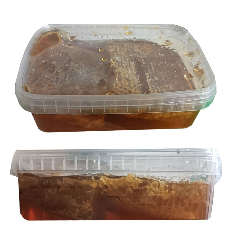 عسل طبیعی با موم محصول تویسرکان