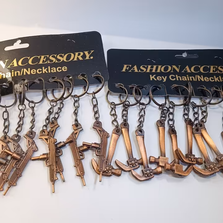 جاسویچی فلزی طرح تفنگ و چکش