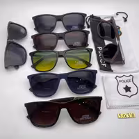 عینک آفتا بی پلیس دسته چوب کد 5038پلاریزه تلق 1/1 ؛همراه با کیسه ودستمال مخصوص پلیس 