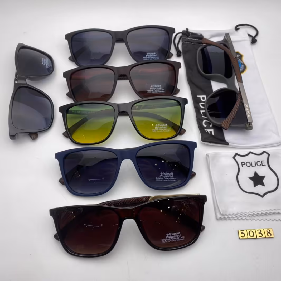 عینک آفتا بی پلیس دسته چوب کد 5038پلاریزه تلق 1/1 ؛همراه با کیسه ودستمال مخصوص پلیس 