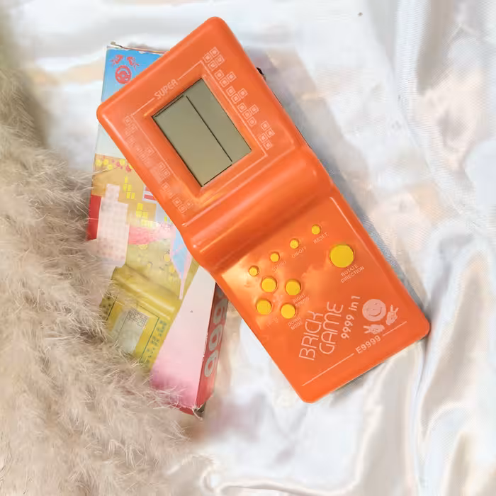 اسباب بازی آتاری دستی باتری خور 