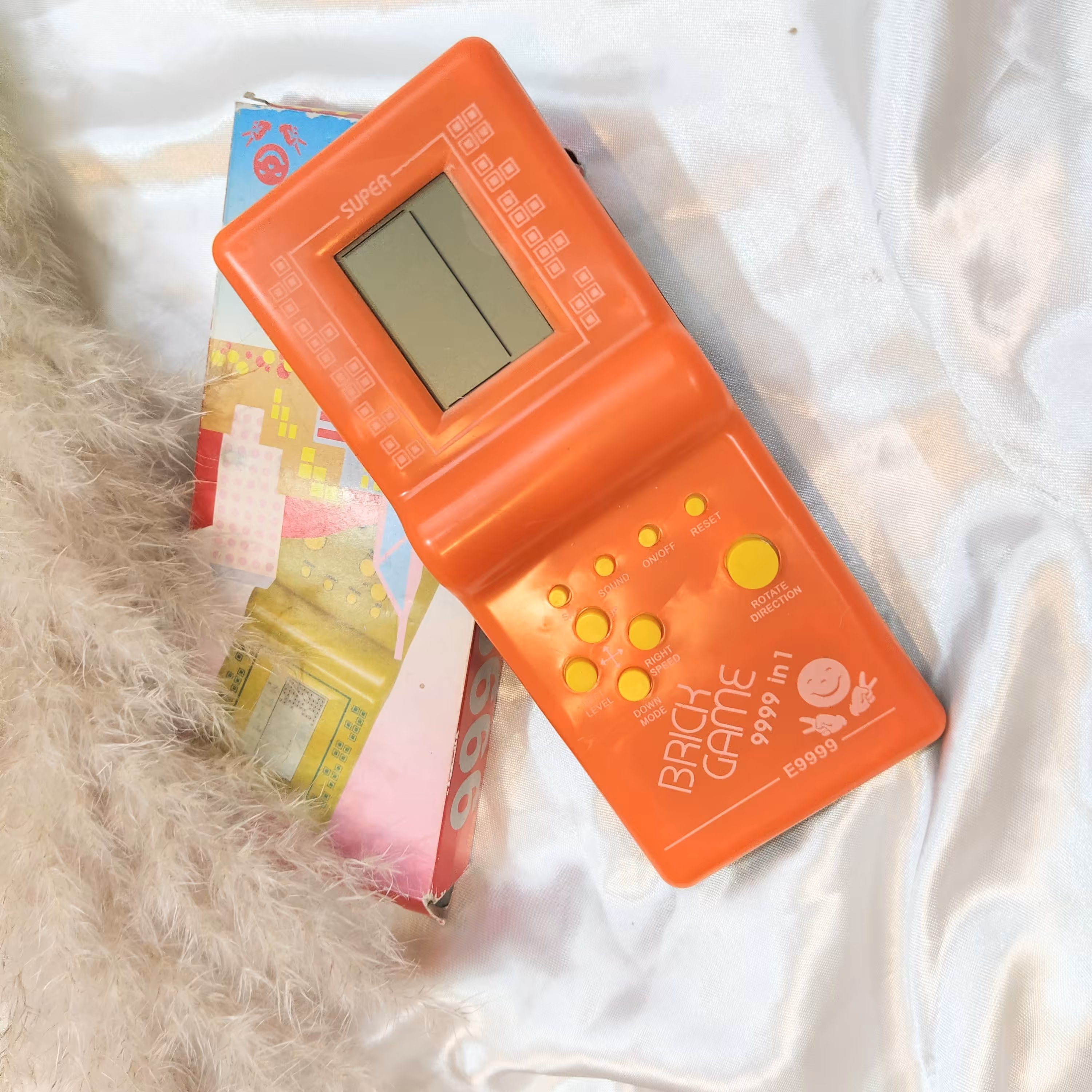 اسباب بازی آتاری دستی باتری خور 