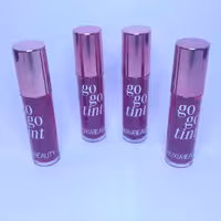 تینت لب هوکسا بیوتی huxabeauty رنگ نارنجی لایت go