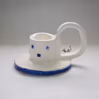 جا شمعی سرامیکی دستساز  با گل های آبی