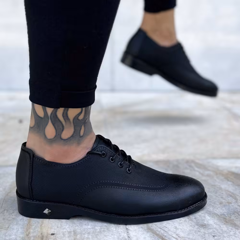 کفش مردانه مشکی جنس رویه چرم صنعتی جنس زیره PVC سایز بندی 40 الی 44