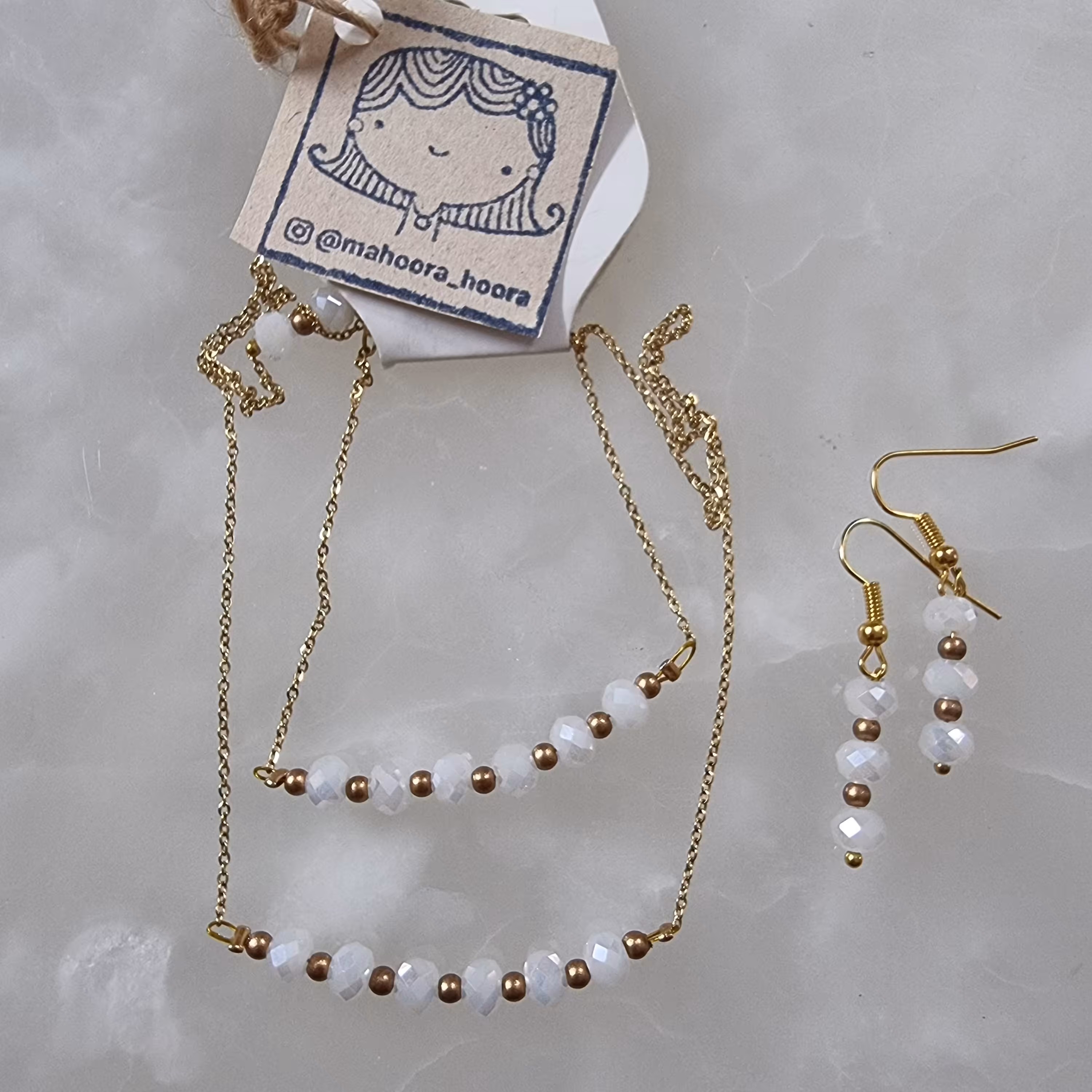 گردنبند دستبند و گوشواره ی کریستال سفید شیری