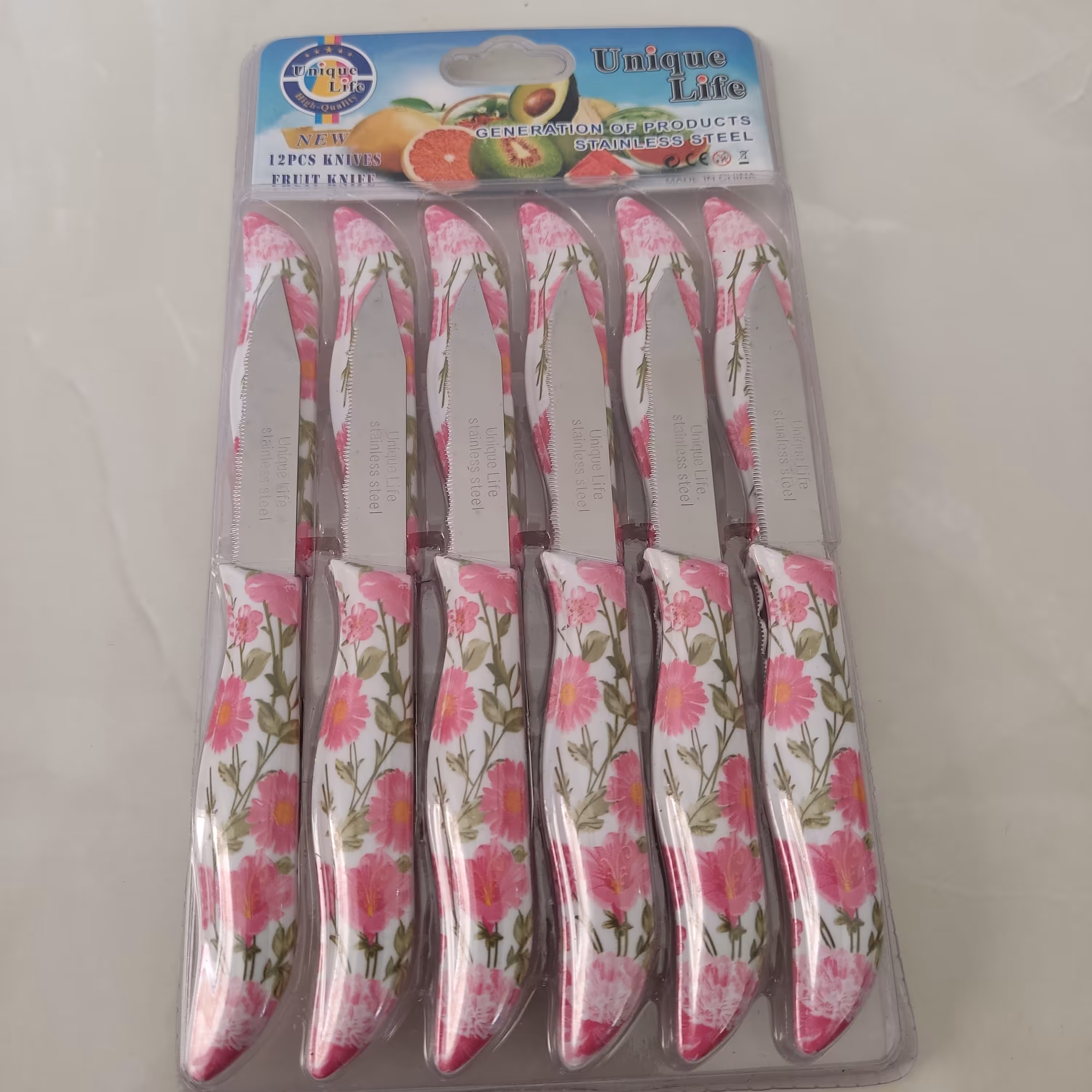 کارد میوه خوری 12عددی اره ای مارک یونیک لایفUnique life رنگ صورتی (چاقو ) تیغه ثابت طول16 سانت.