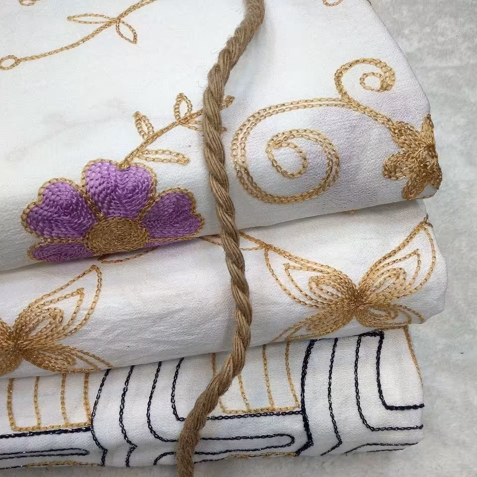 پارچه کرسپو سفید خامه دوزی 