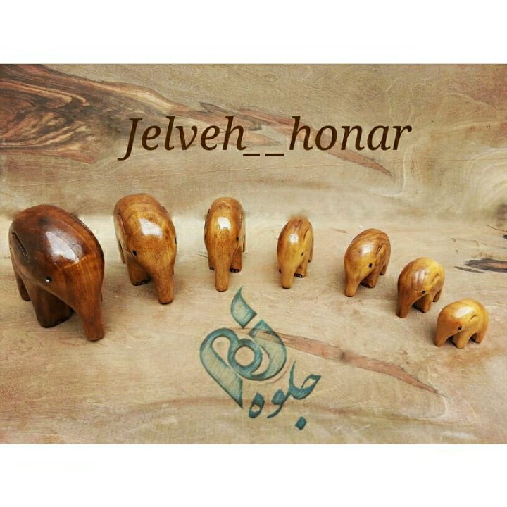 گله فیل چوبی