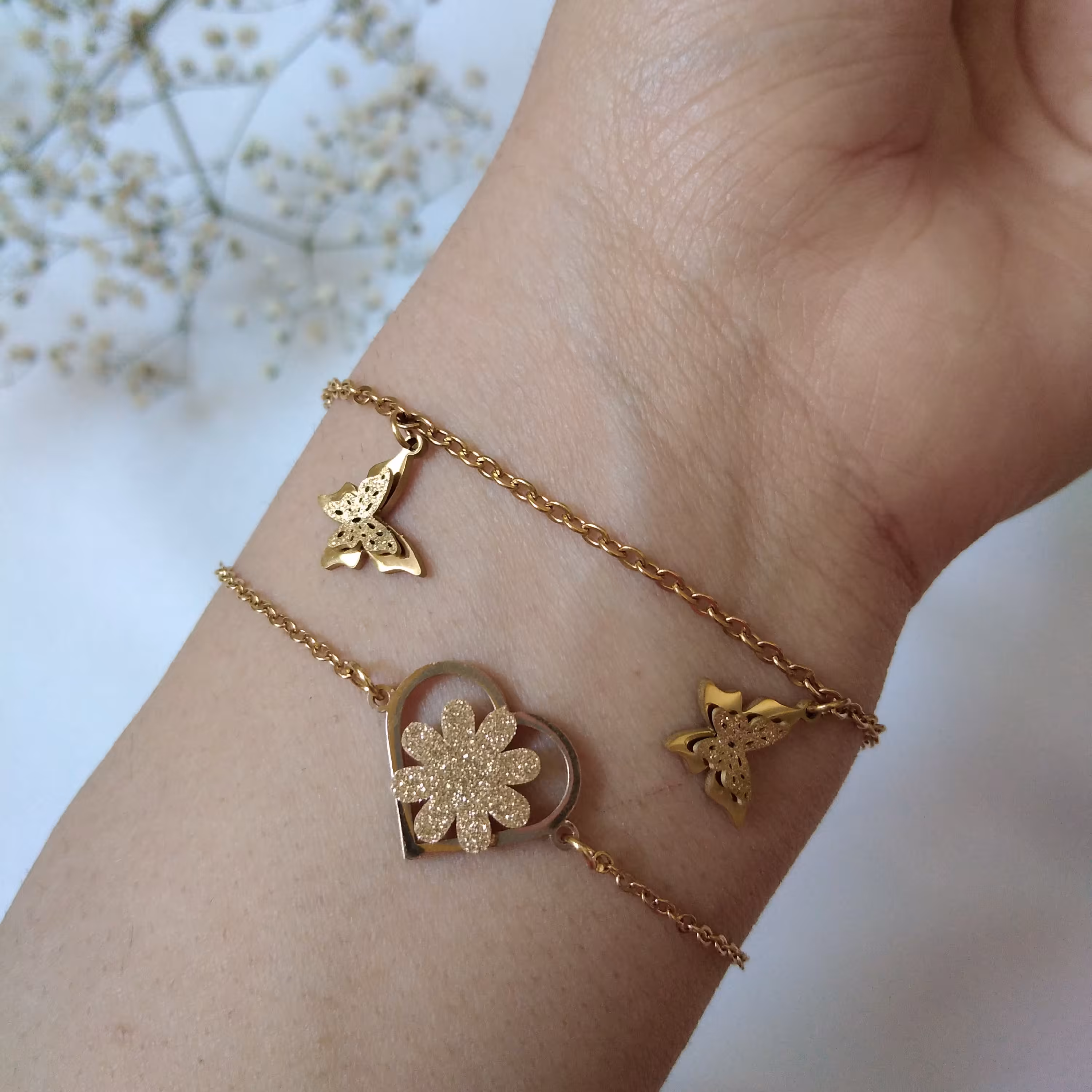 دستبند پروانه ای و قلبی استیل رنگ ثابت کیفیت عالی رنگ طلایی