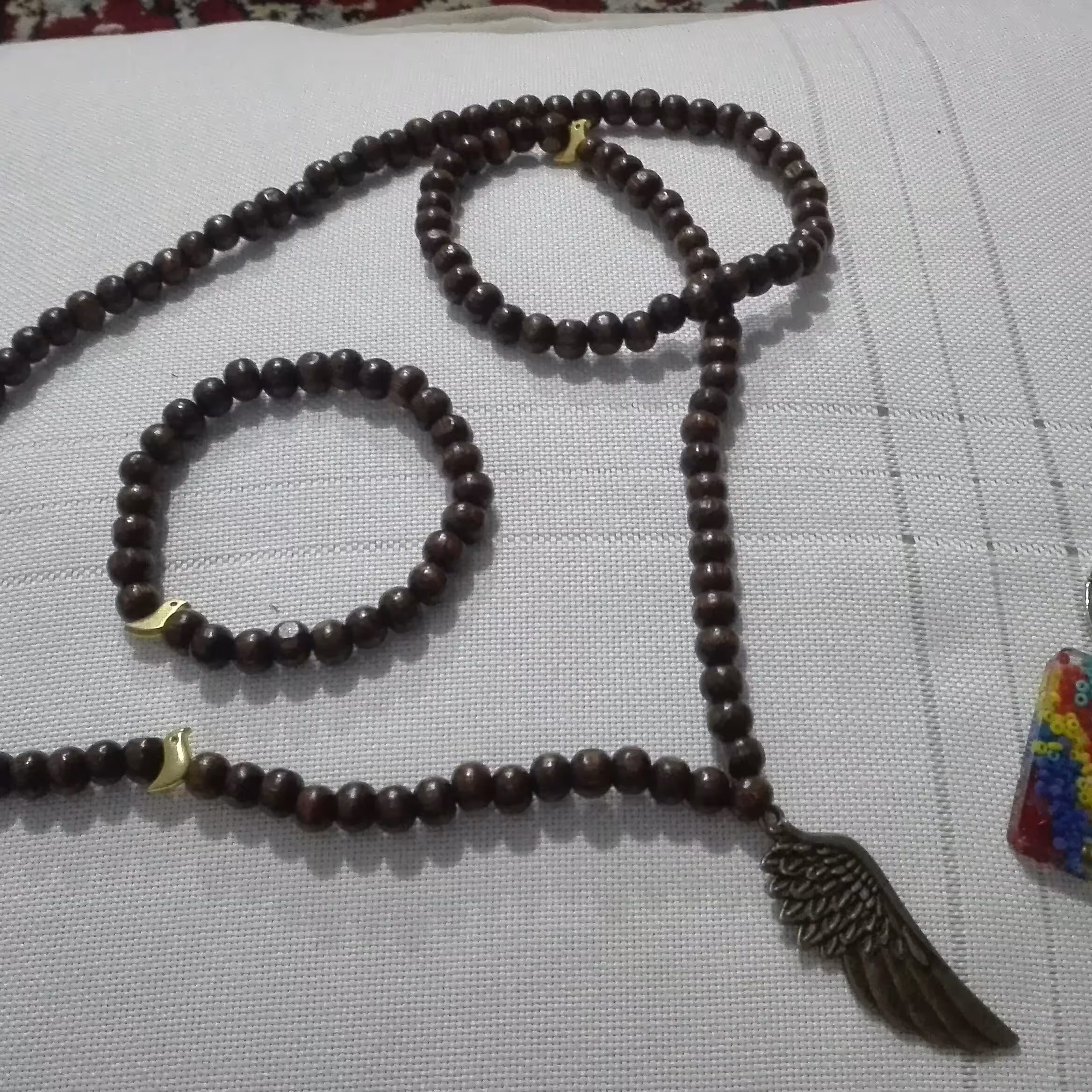 ست گردنبد و دستبند پرنده و بال