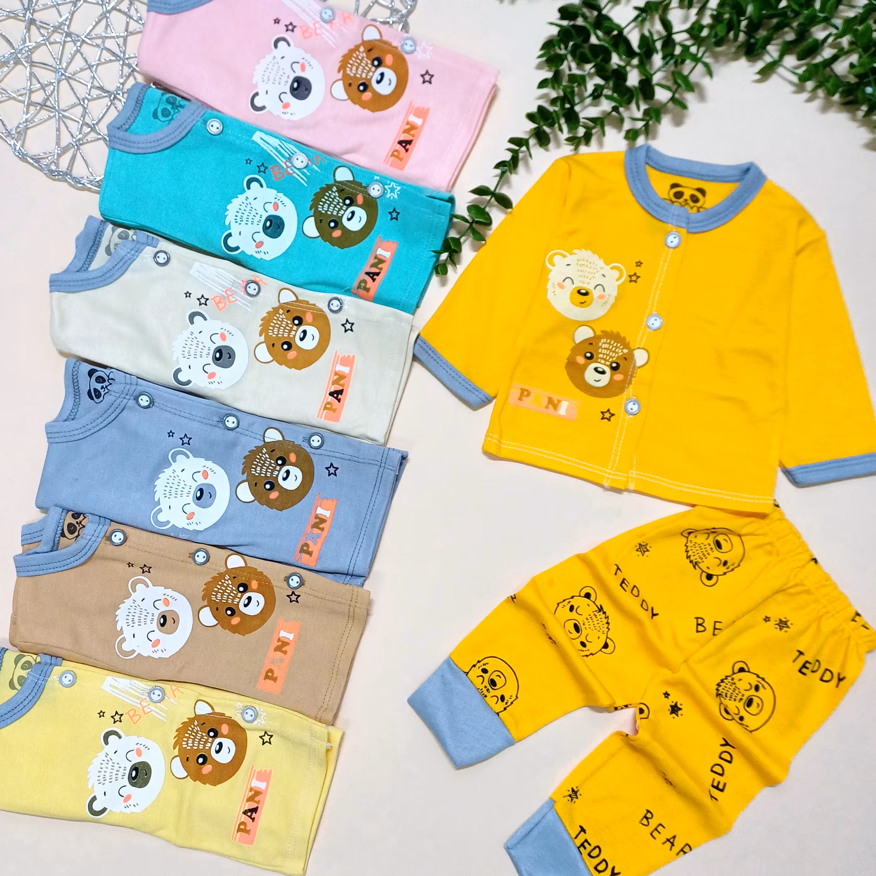 لباس نوزادی پسرانه دخترانه بلوز و شلوار نوزادی پسرانه دخترانه سایز صفر رنگ صورتی طوسی سبز پرتقالی لیمویی کرمی نخودی 