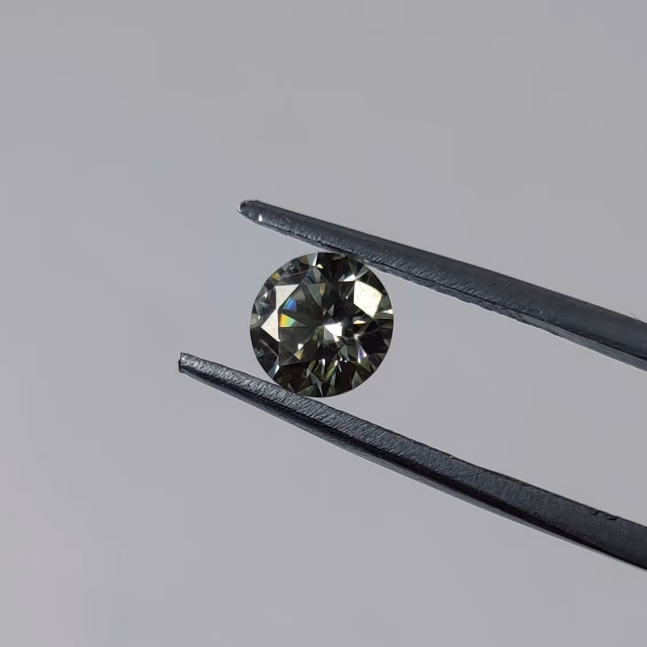 نگین سنگ موزانایت ( الماس ) اصل کشور روسیه (رنگ زرد روشن پر تلألو)