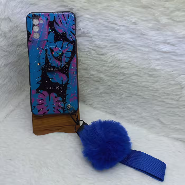 گارد دخترانه فانتزی پام پام A03s طرح برگ آبی مناسب گوشی  Samsung A03s به همراه بند پام و پاپ سوکت