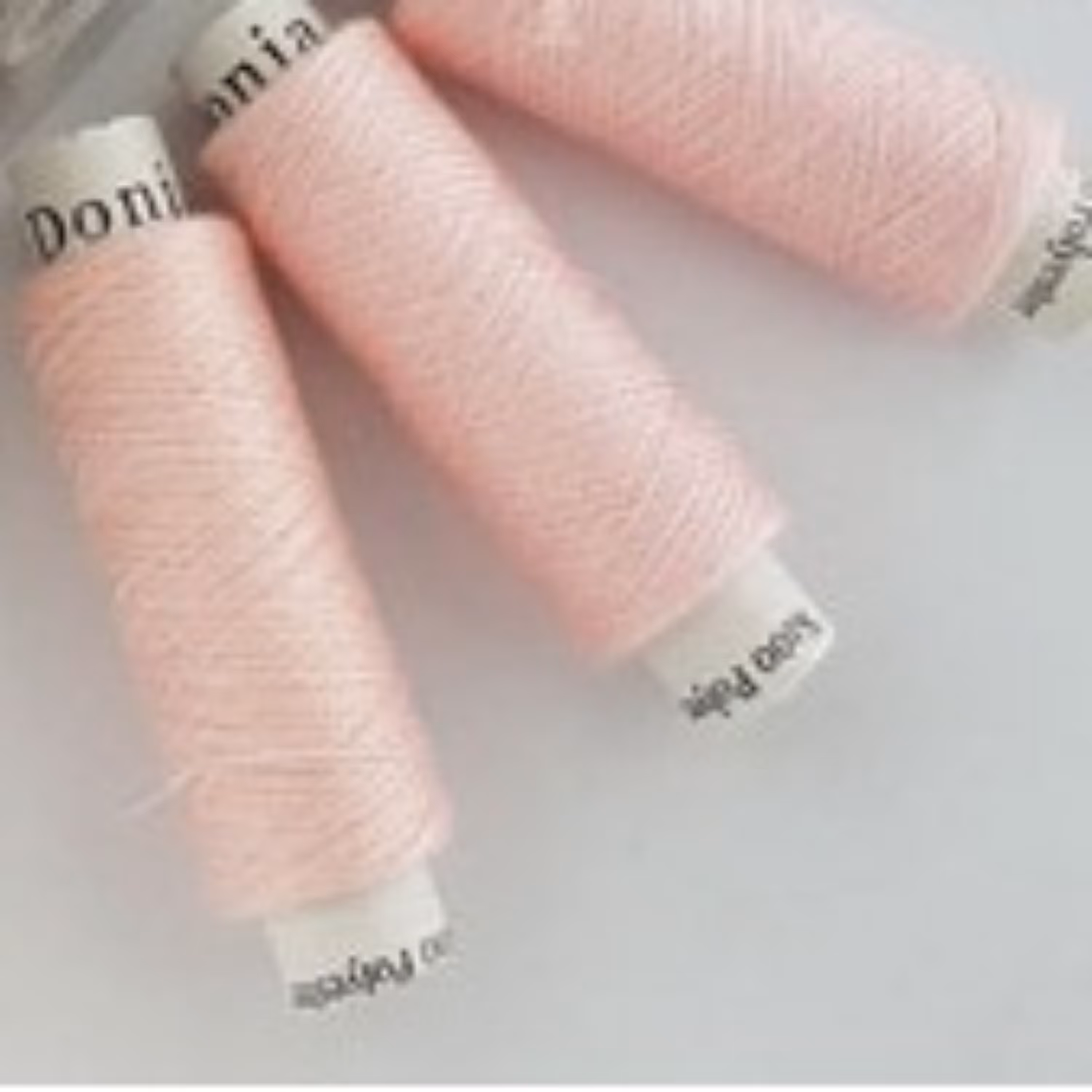 قرقره نخ خیاطی دنیا صورتی کم رنگ