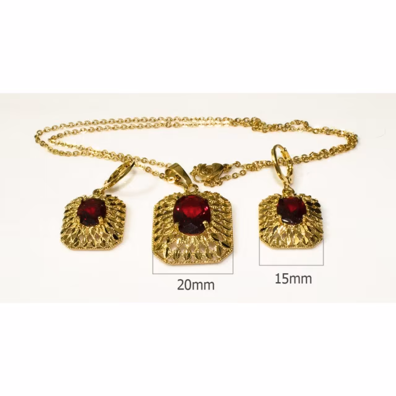 نیم ست استیل طلایی با سنگ قرمز