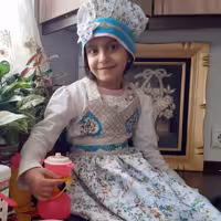 پیش بند و کلاه آشپزی