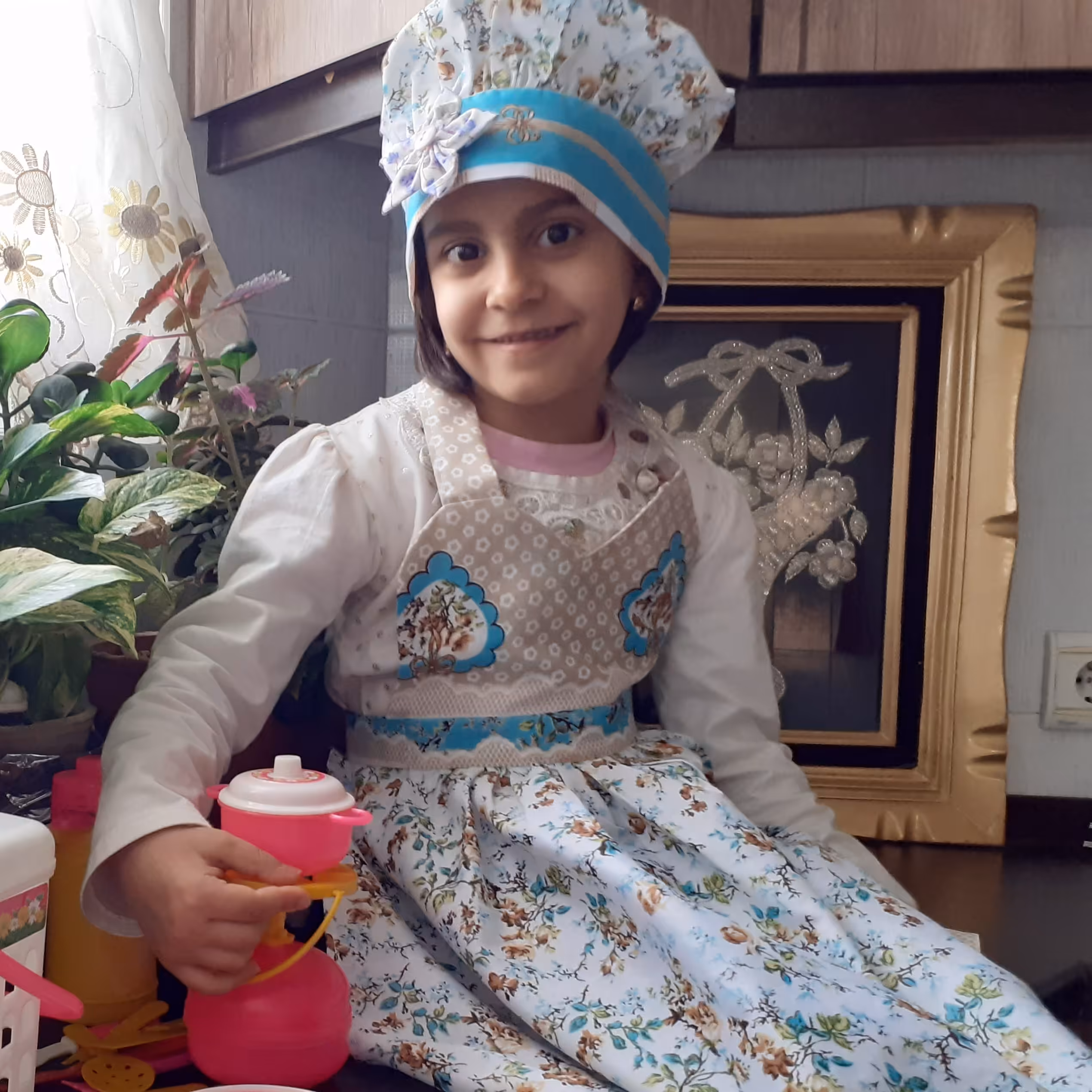 پیش بند و کلاه آشپزی