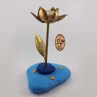 جا شمعی سنگ و فلز با گل طلایی