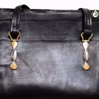 کیف دوشی زنانه دست دوز چرم طبیعی
