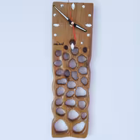 ساعت دیواری چوبی مدل homi . دست ساز 