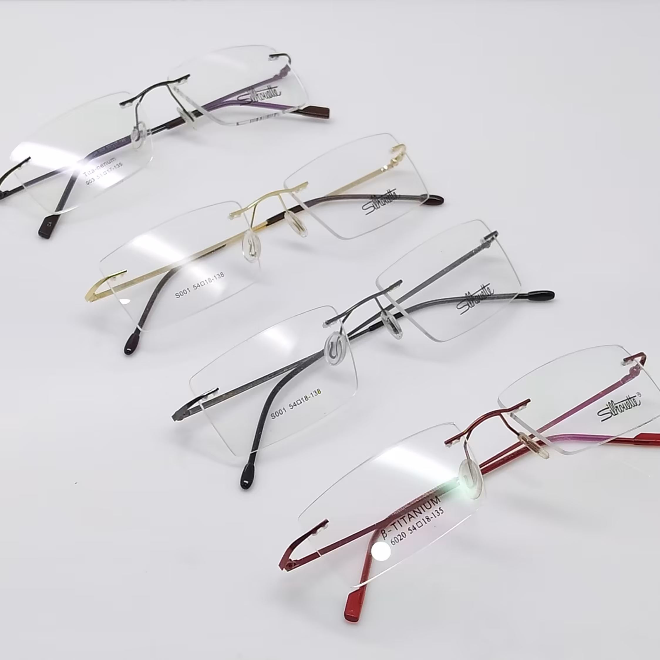 عینک طبی بی فریم فریم لس جنسیت فریم بدون قاب فلزی تیتانیوم رنگ بندی  نوک مدادی و قهوه ای 