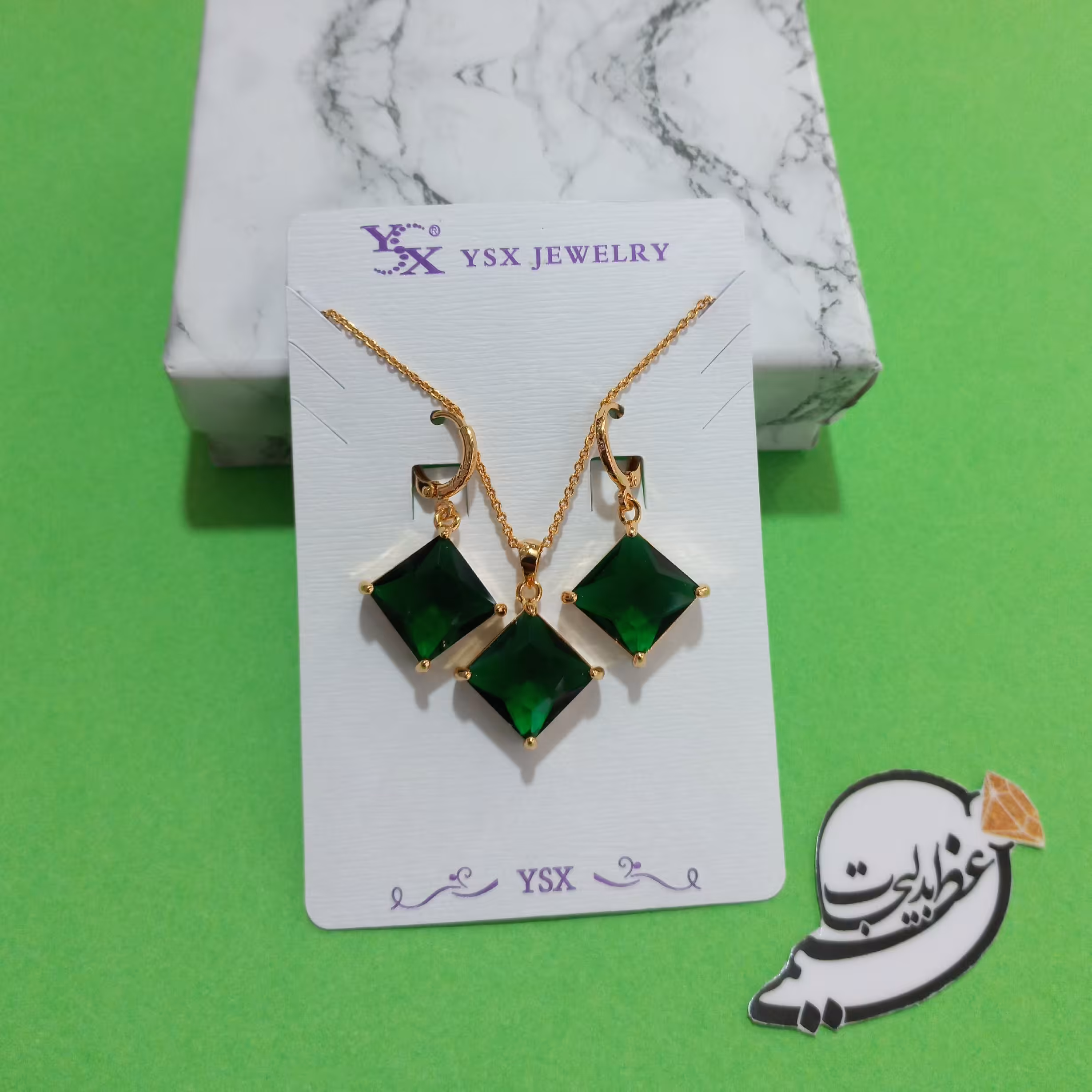نیم ست برند Ysxاز جنس مس و روکش طلا با کیفیت و زیبا با نگین های سبز