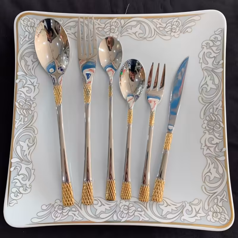 قاشق چنگال 24 نفره 120 پارچه یونیک دهنه اروپایی مدل آناناسی طلایی

