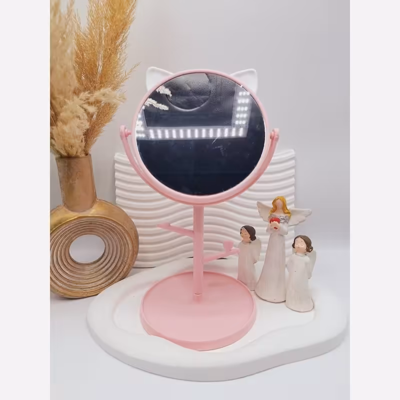 آینه گرد رومیزی مدل استندجواهرات طرح گربه رنگ صورتی