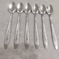 قاشق شربت خوری طرح گل میخک بسته 6عددی جنس فولاد ضد زنگ عیار 18 