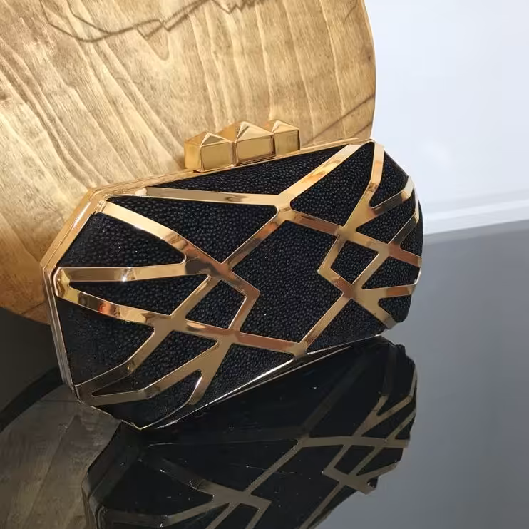 کیف مجلسی دخترانه طرح لوزی رنگ طلایی مشکی