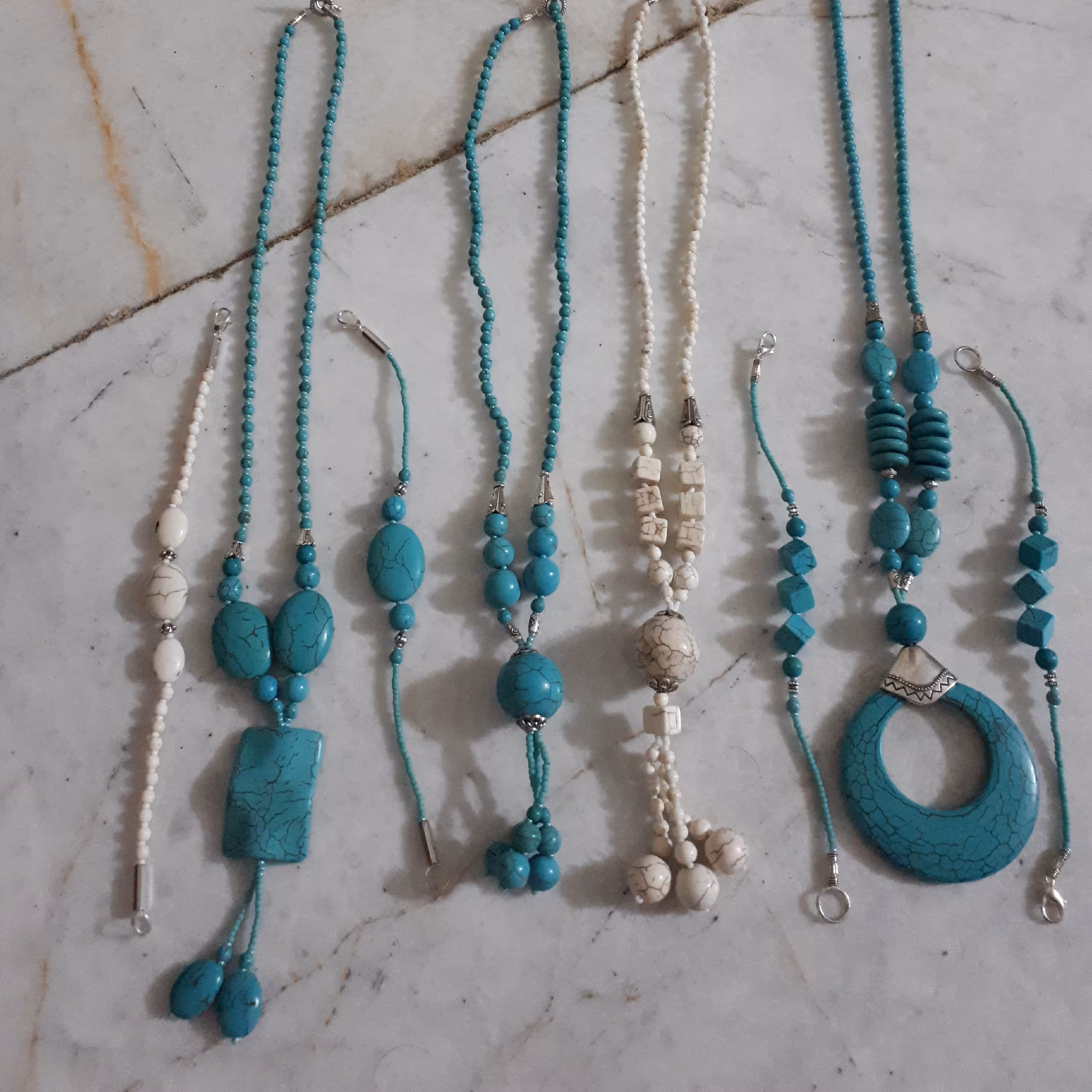 گردنبند دستبند فیروزه با سنگ طبیعی فیروزه نیشابور  مجموعه ای از گردنبند ودستبند با سنگ های   آمیتیس عقیق یشم چشم ببر شجر