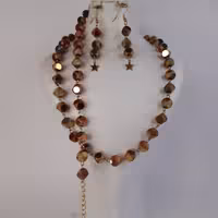 سرویس زنجیری کریستال تراش هولوگرامی 
با متریال استیل درجه یک و رنگ ثابت
با دستبند و اویز ستاره
