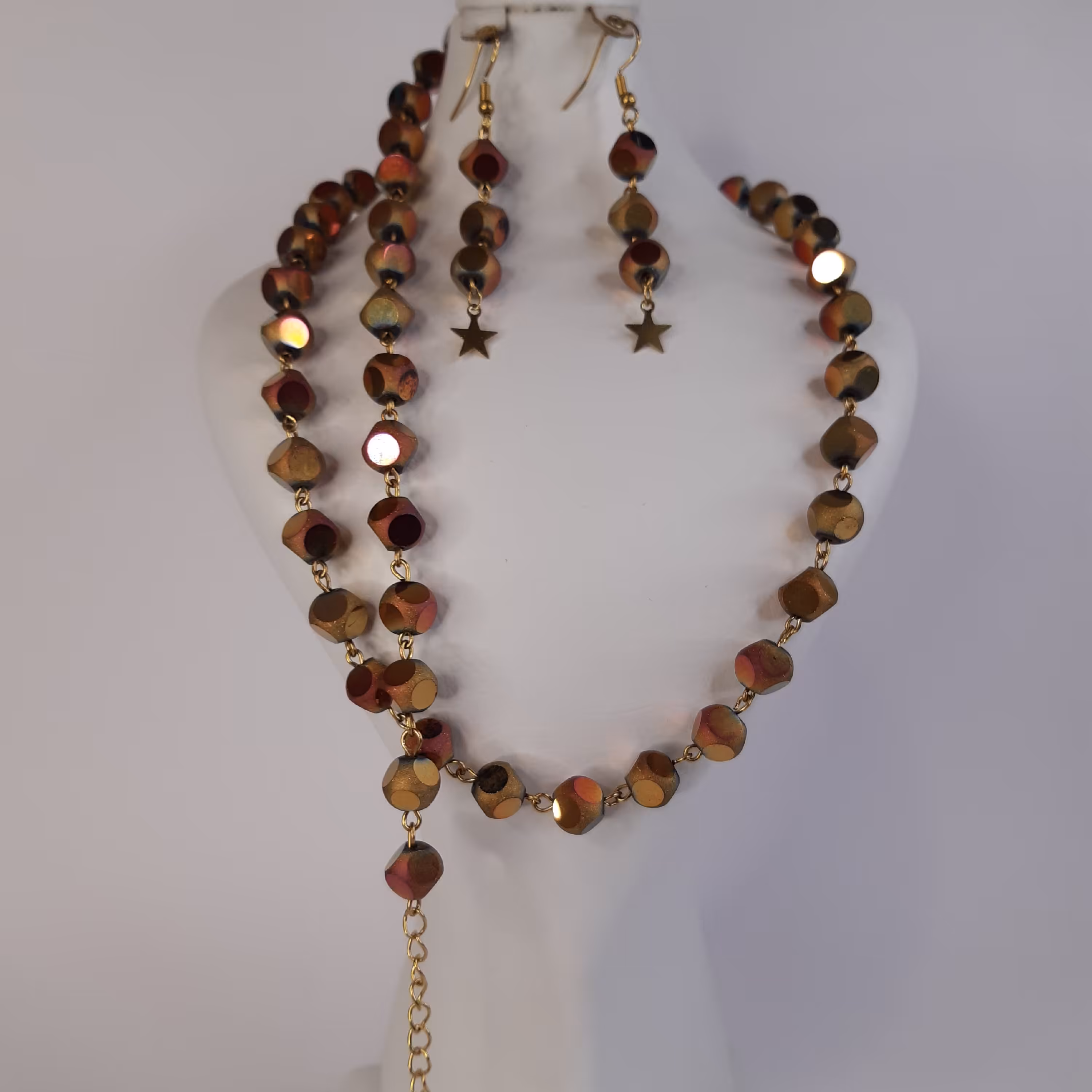 سرویس زنجیری کریستال تراش هولوگرامی 
با متریال استیل درجه یک و رنگ ثابت
با دستبند و اویز ستاره
