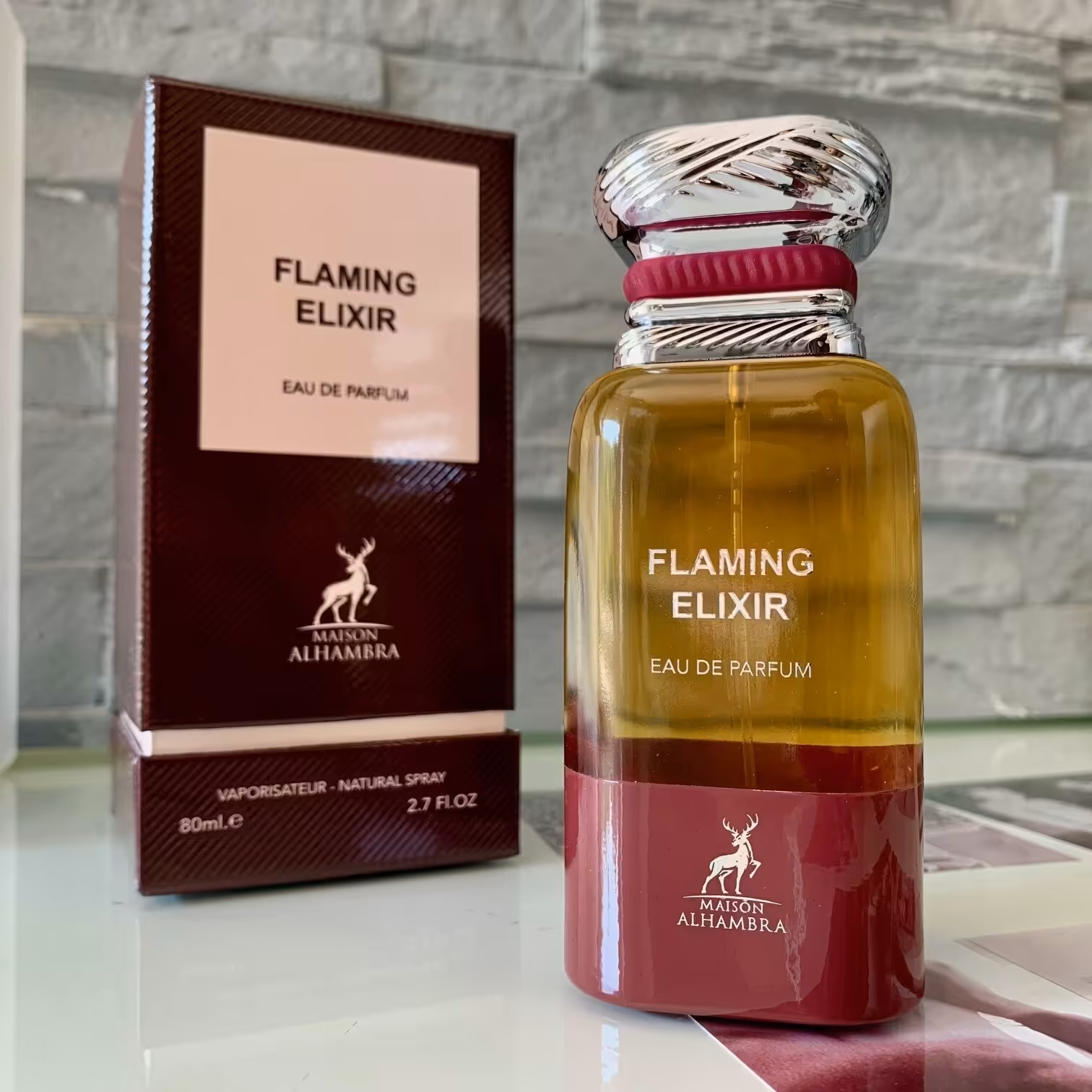 عطر میسن الحمرا فلیمینگ الیکسیر  (Maison Alhambra Flaming Elixir (Lovely Cherie