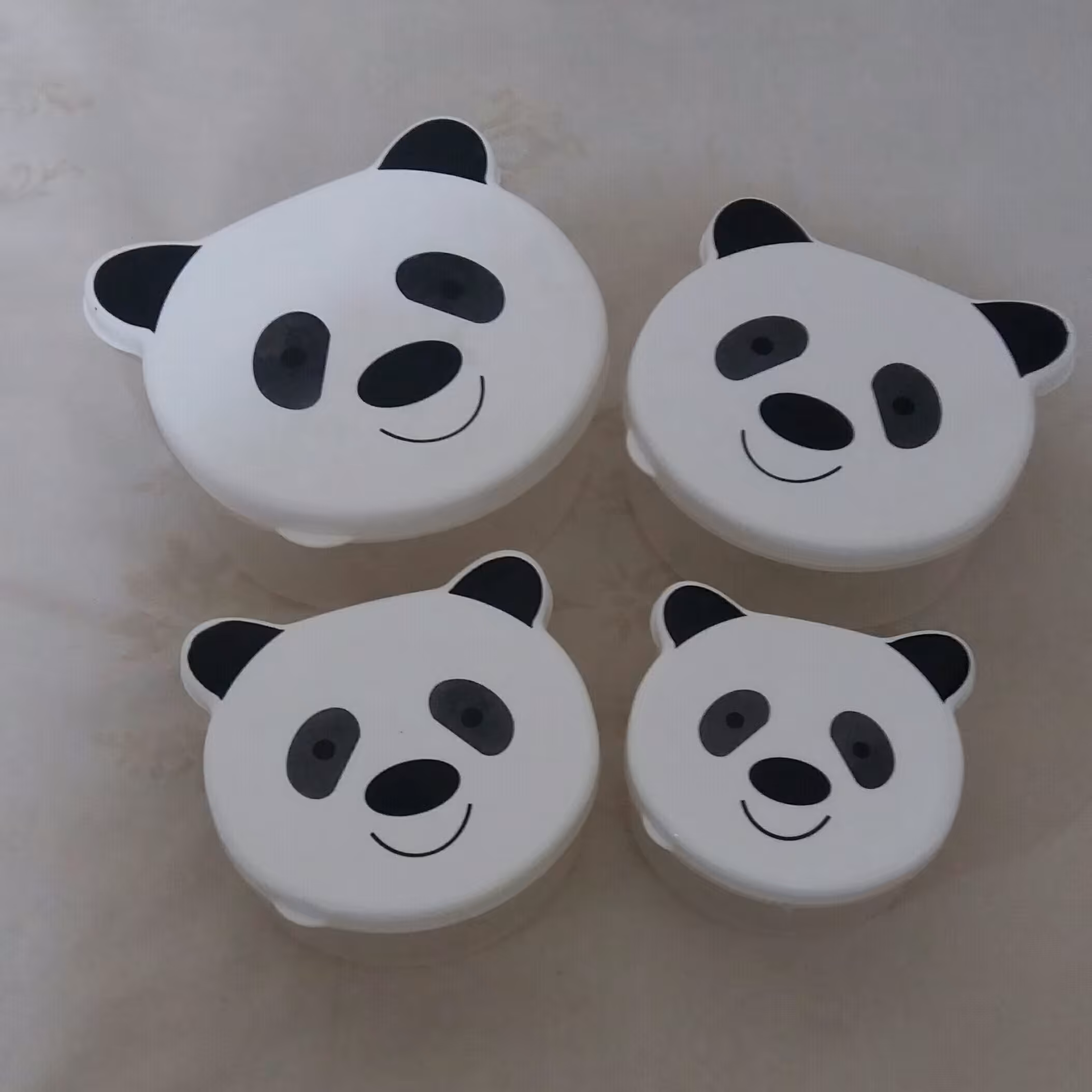 ظرف پلاستیکی 4تیکه، رنگ سفید با درب عروسکی، 4سایز مختلف،