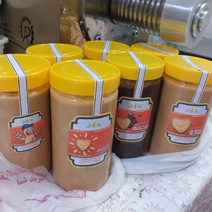 کره بادام زمینی یک کیلویی پارسی کام