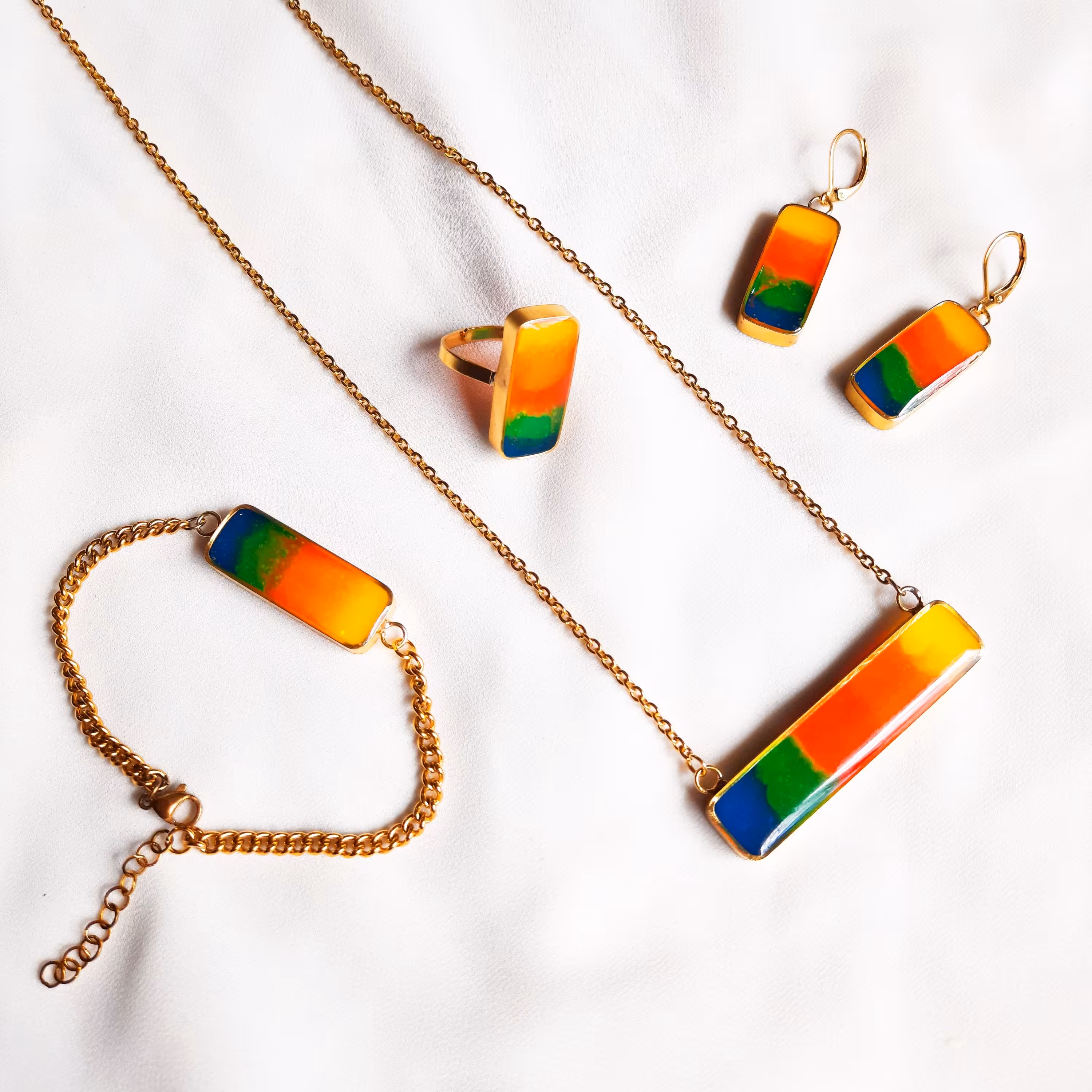 ست کامل بدلیجات سبک اروپایی نئونی دستبند کارتیر زنجیر ها استیل آبکاری طلا زیورآلات گردنبند گوشواره دستبند انگشتر