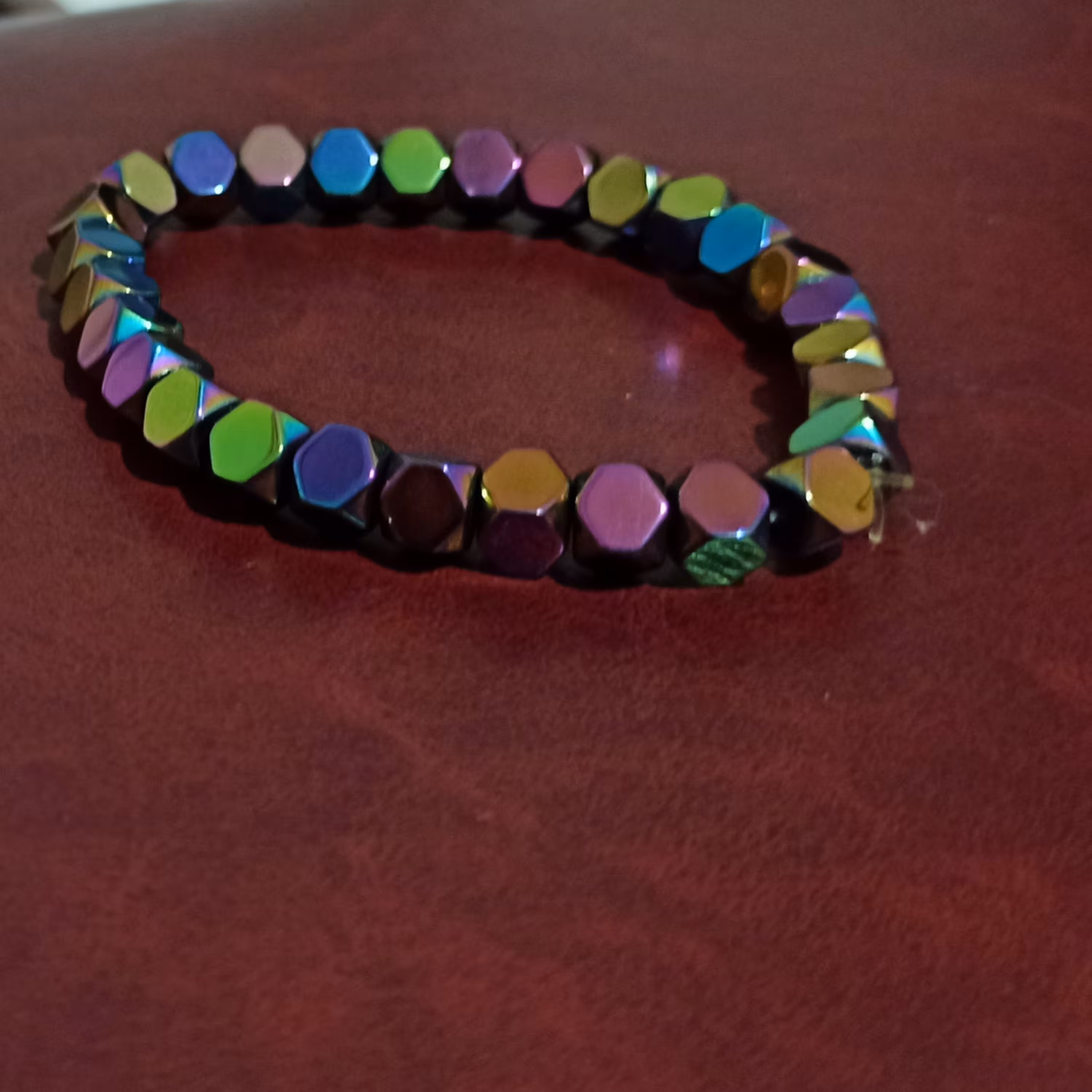 دستبند سنگ حدید هفت رنگ 