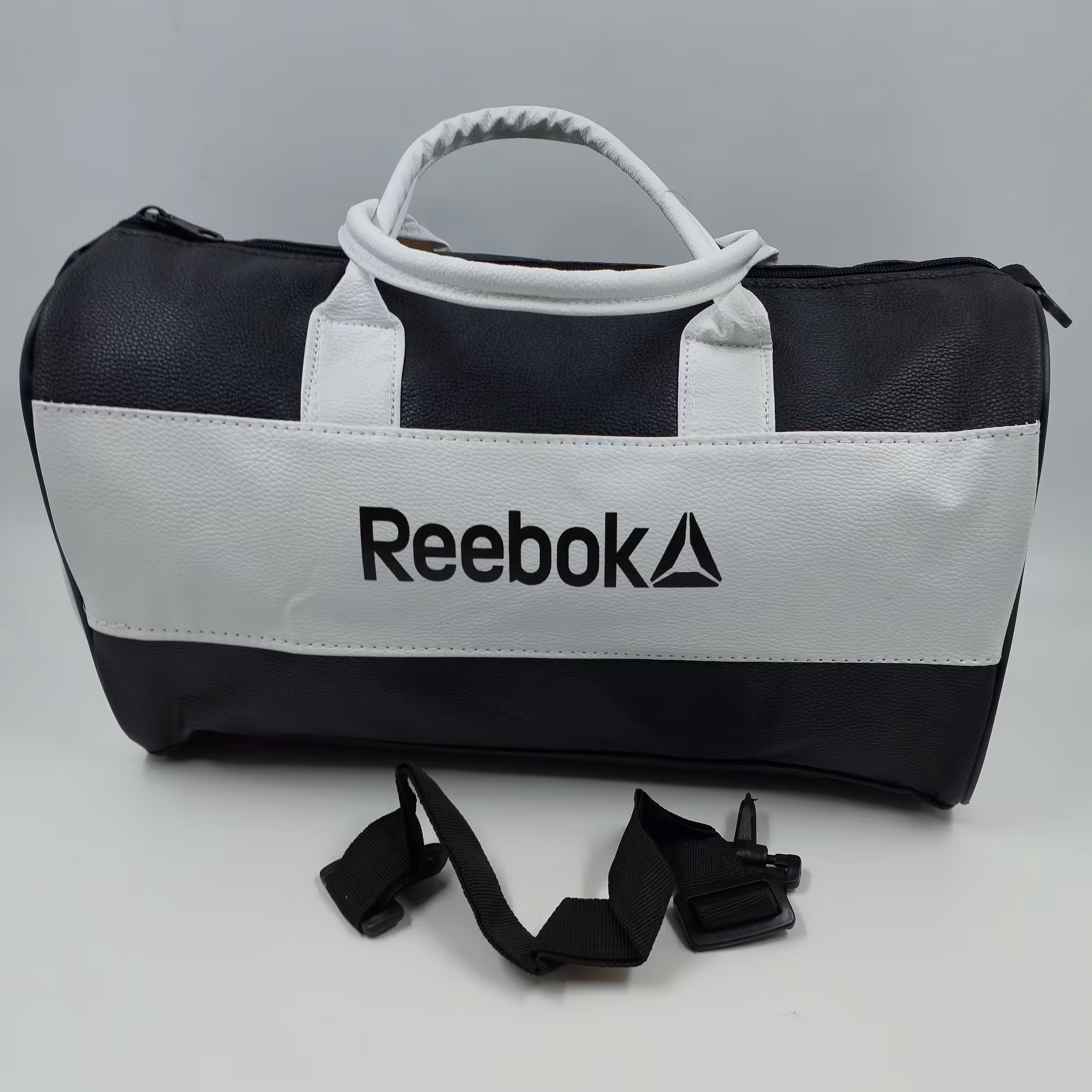 ساک ورزشی چرمی مردانه زنانه ریباک REEBOK اسپرت 2110 مشکی